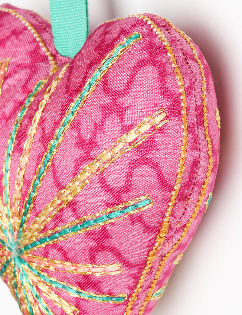 Timeless Heart ornament made from upcycled clothing and recycled fabric, filled with organic cotton and hand-finished with vibrant silk and metallic thread. An eco-friendly, carbon neutral fashion piece that supports green fashion and fair trade apparel.