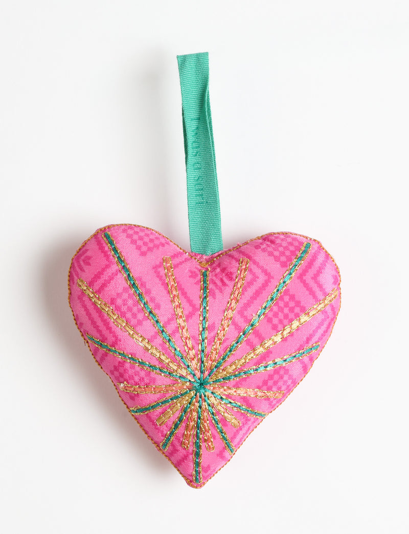 Timeless Heart ornament made from upcycled clothing and recycled fabric, filled with organic cotton and hand-finished with vibrant silk and metallic thread. An eco-friendly, carbon neutral fashion piece that supports green fashion and fair trade apparel.