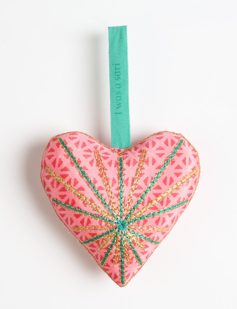 Timeless Heart ornament made from upcycled clothing and recycled fabric, filled with organic cotton and hand-finished with vibrant silk and metallic thread. An eco-friendly, carbon neutral fashion piece that supports green fashion and fair trade apparel.