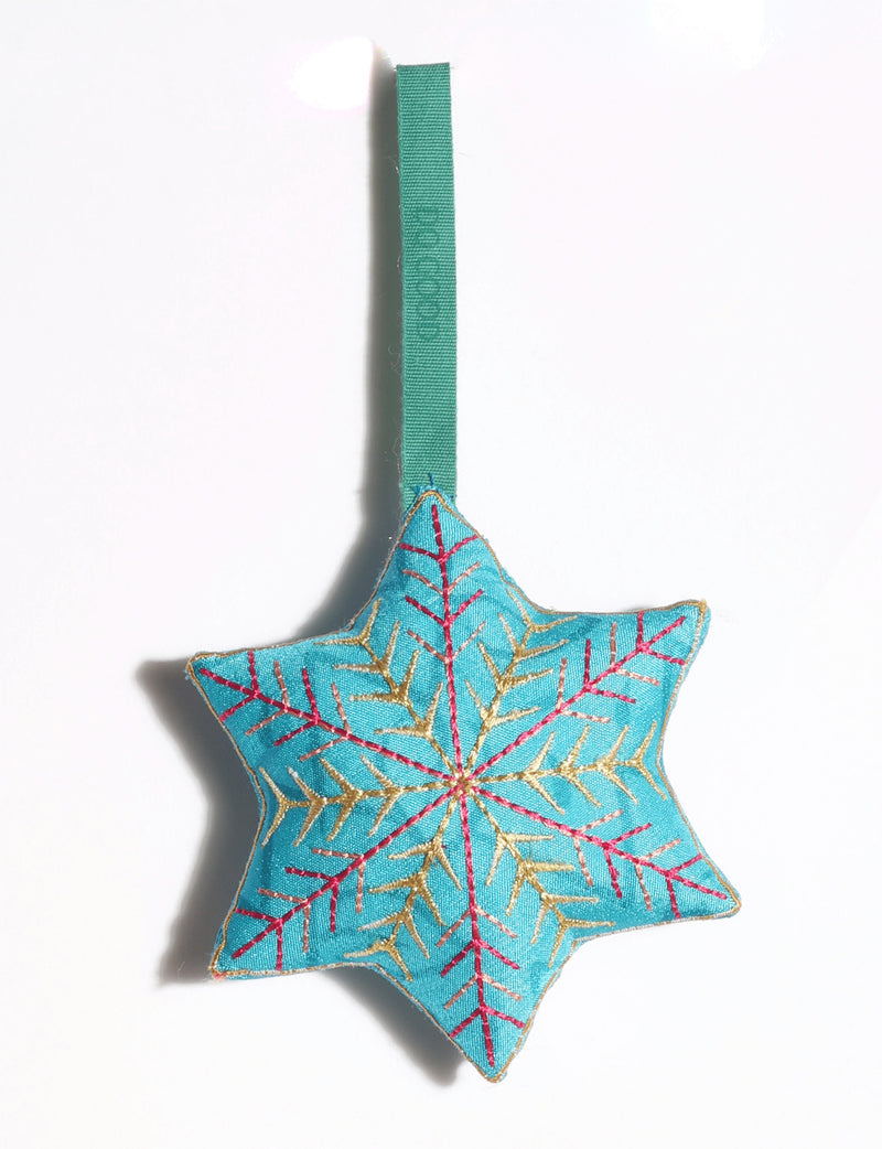 Handcrafted snowflake Christmas ornament made from preloved saris with silk and metallic gold thread embroidery