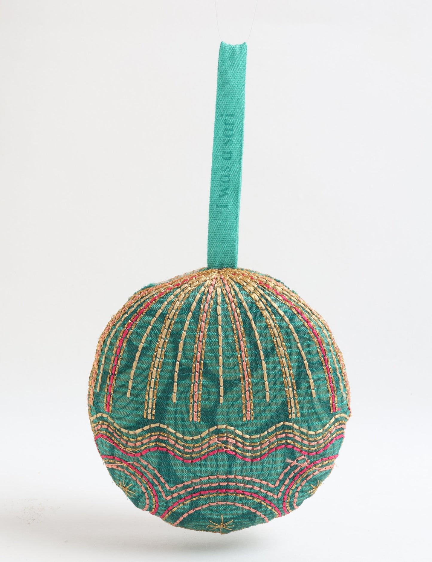 Timeless Full Moon ornament handmade from recycled sari fabric, featuring organic cotton filling and gold thread embroidery — a beautiful piece of upcycled clothing, eco clothing, and sustainable women’s fashion made from repurposed materials.