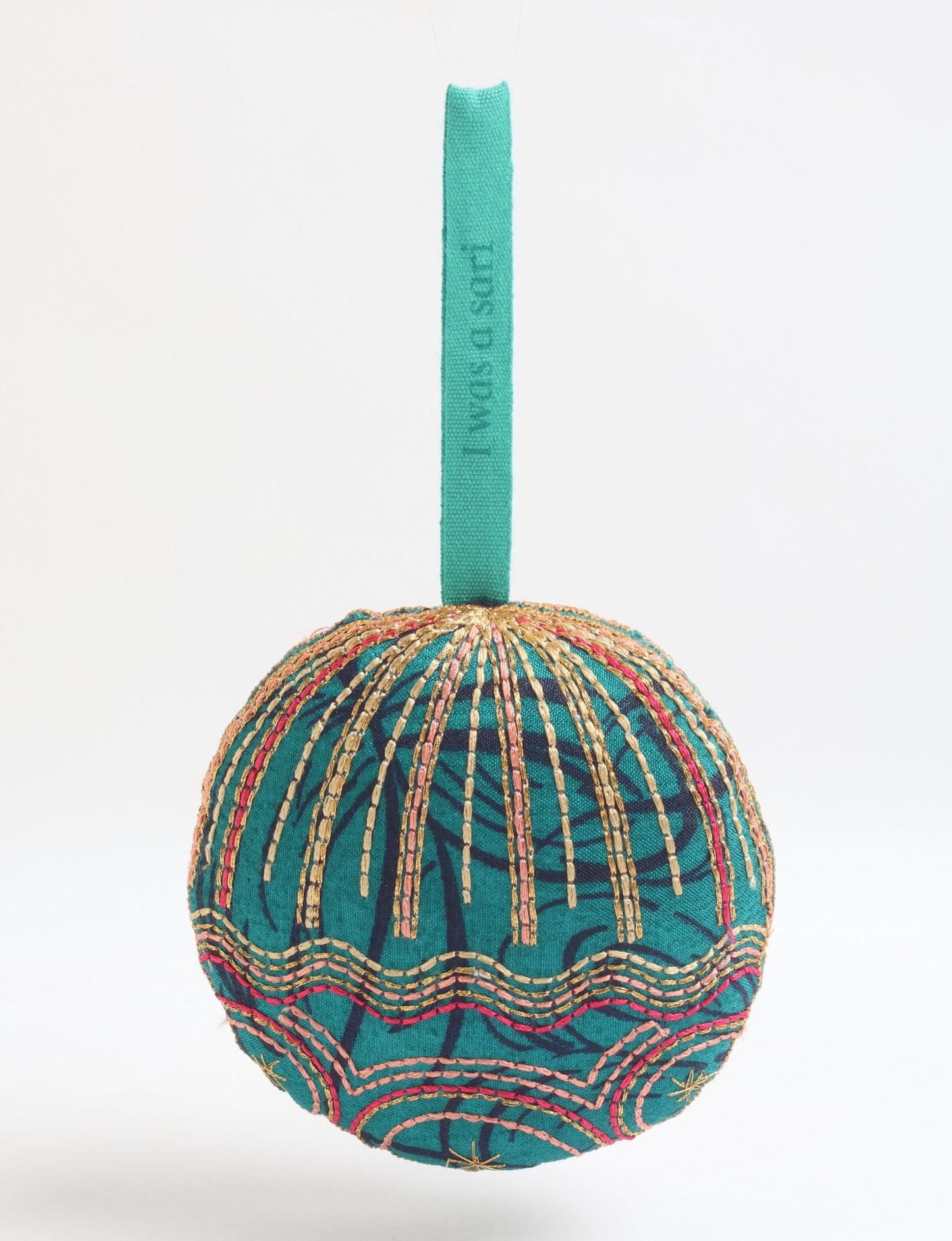 Timeless Full Moon ornament handmade from recycled sari fabric, featuring organic cotton filling and gold thread embroidery — a beautiful piece of upcycled clothing, eco clothing, and sustainable women’s fashion made from repurposed materials.