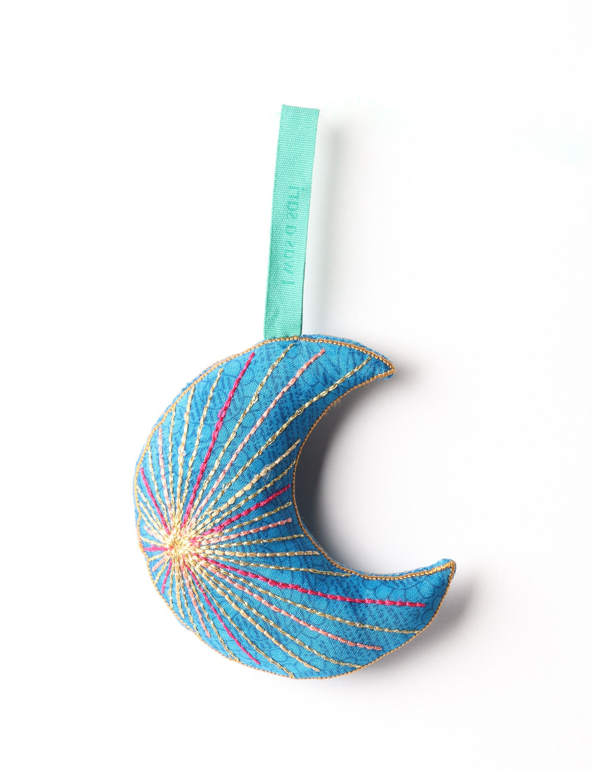 Blue fabric crescent moon ornament with multicolored stitched lines and a matching blue hanging loop against white background