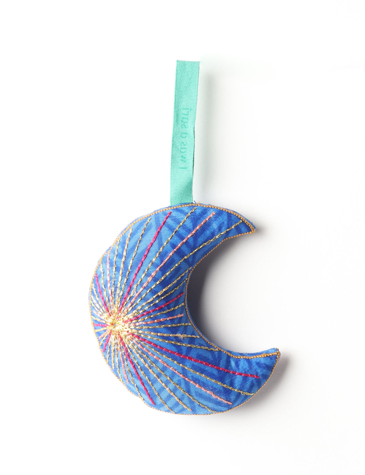 Blue fabric crescent moon ornament with multicolored stitched lines and a matching blue hanging loop against white background