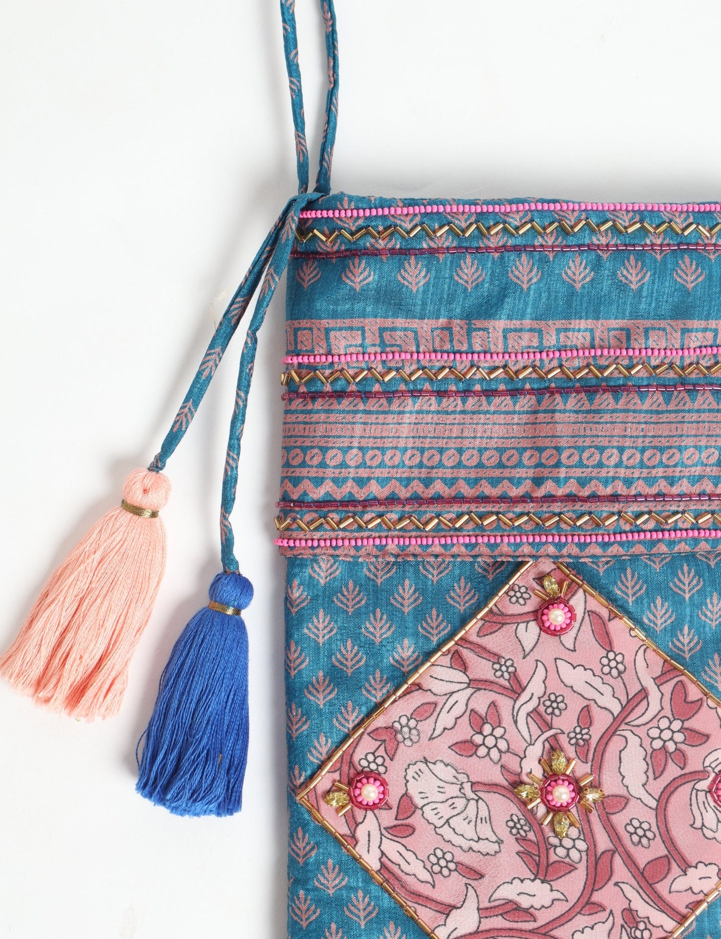 Cheer Christmas stocking made from recycled sari fabric with patchwork, gold hand embroidery, stones, sequins, pearls, glass beads, heart charm, and tassel — upcycled women’s clothing, conscious clothing, green fashion, upcycling fashion, environmentally friendly clothing, products made from textile waste, repurposed clothing, carbon neutral fashion, eco clothing, natural clothing.