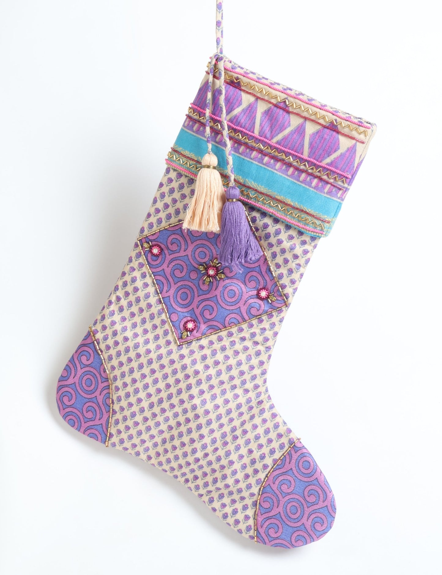 Cheer Christmas stocking made from recycled sari fabric with patchwork, gold hand embroidery, stones, sequins, pearls, glass beads, heart charm, and tassel — upcycled women’s clothing, conscious clothing, green fashion, upcycling fashion, environmentally friendly clothing, products made from textile waste, repurposed clothing, carbon neutral fashion, eco clothing, natural clothing.