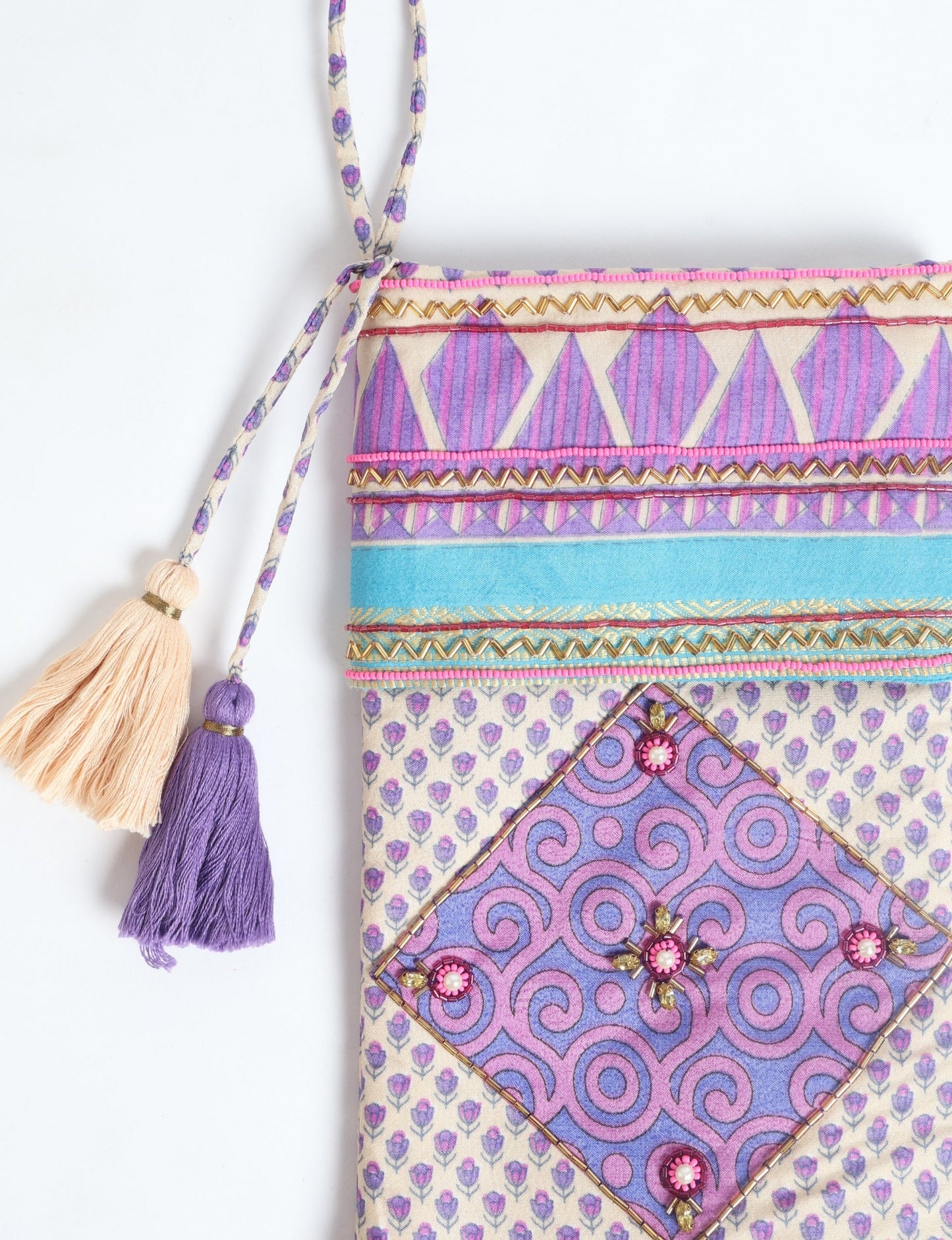 Cheer Christmas stocking made from recycled sari fabric with patchwork, gold hand embroidery, stones, sequins, pearls, glass beads, heart charm, and tassel — upcycled women’s clothing, conscious clothing, green fashion, upcycling fashion, environmentally friendly clothing, products made from textile waste, repurposed clothing, carbon neutral fashion, eco clothing, natural clothing.