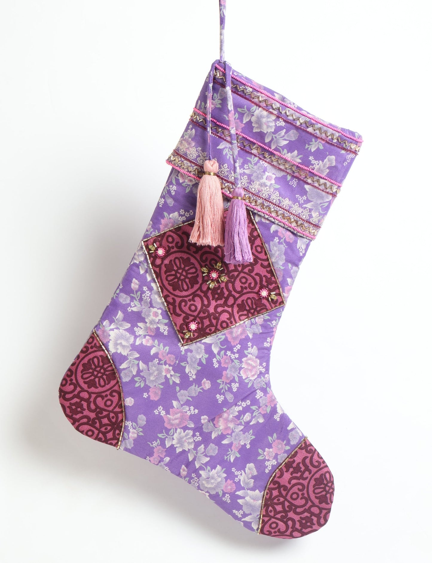 Cheer Christmas stocking made from recycled sari fabric with patchwork, gold hand embroidery, stones, sequins, pearls, glass beads, heart charm, and tassel — upcycled women’s clothing, conscious clothing, green fashion, upcycling fashion, environmentally friendly clothing, products made from textile waste, repurposed clothing, carbon neutral fashion, eco clothing, natural clothing.