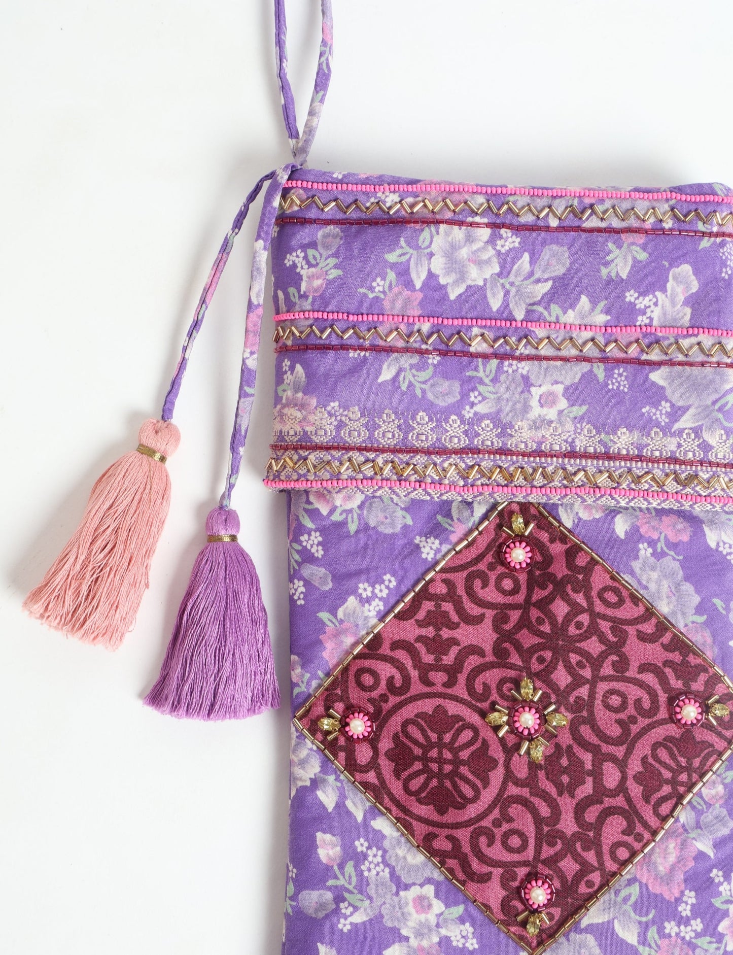 Cheer Christmas stocking made from recycled sari fabric with patchwork, gold hand embroidery, stones, sequins, pearls, glass beads, heart charm, and tassel — upcycled women’s clothing, conscious clothing, green fashion, upcycling fashion, environmentally friendly clothing, products made from textile waste, repurposed clothing, carbon neutral fashion, eco clothing, natural clothing.