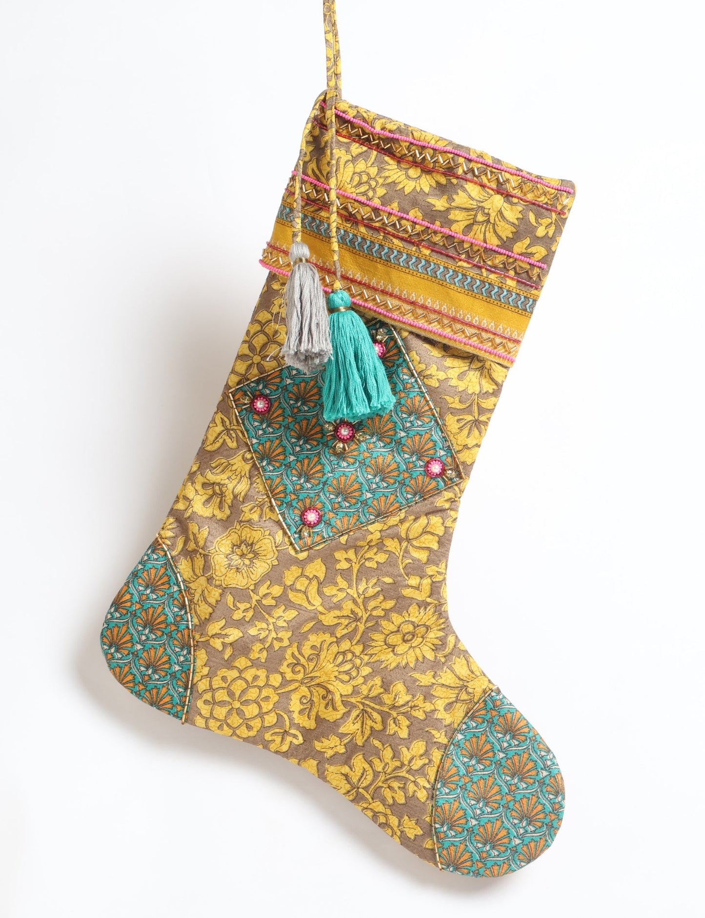 Cheer Christmas stocking made from recycled sari fabric with patchwork, gold hand embroidery, stones, sequins, pearls, glass beads, heart charm, and tassel — upcycled women’s clothing, conscious clothing, green fashion, upcycling fashion, environmentally friendly clothing, products made from textile waste, repurposed clothing, carbon neutral fashion, eco clothing, natural clothing.
