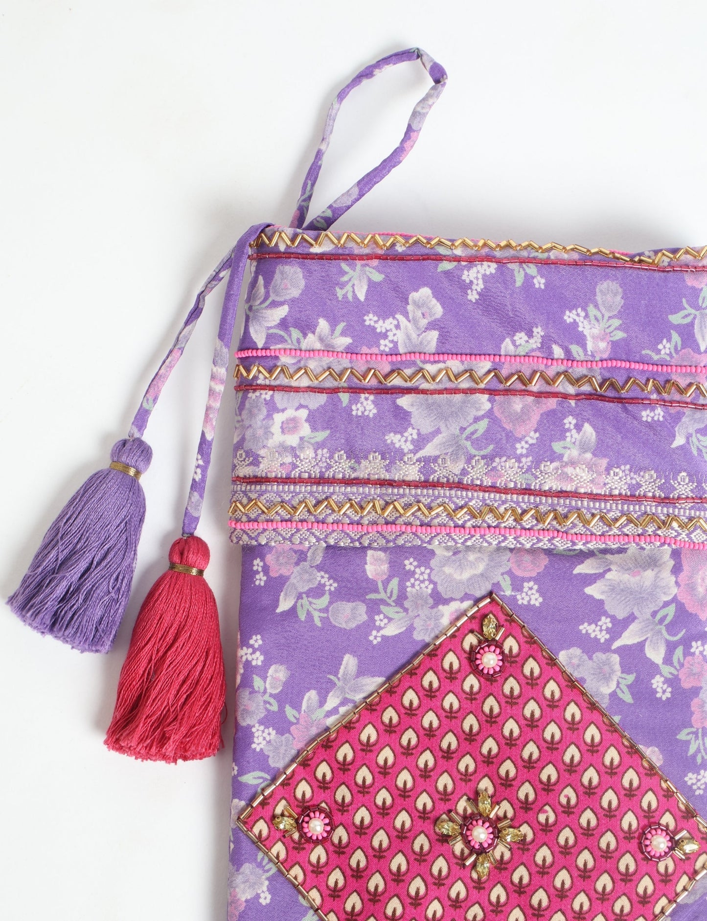 Cheer Christmas stocking made from recycled sari fabric with patchwork, gold hand embroidery, stones, sequins, pearls, glass beads, heart charm, and tassel — upcycled women’s clothing, conscious clothing, green fashion, upcycling fashion, environmentally friendly clothing, products made from textile waste, repurposed clothing, carbon neutral fashion, eco clothing, natural clothing.