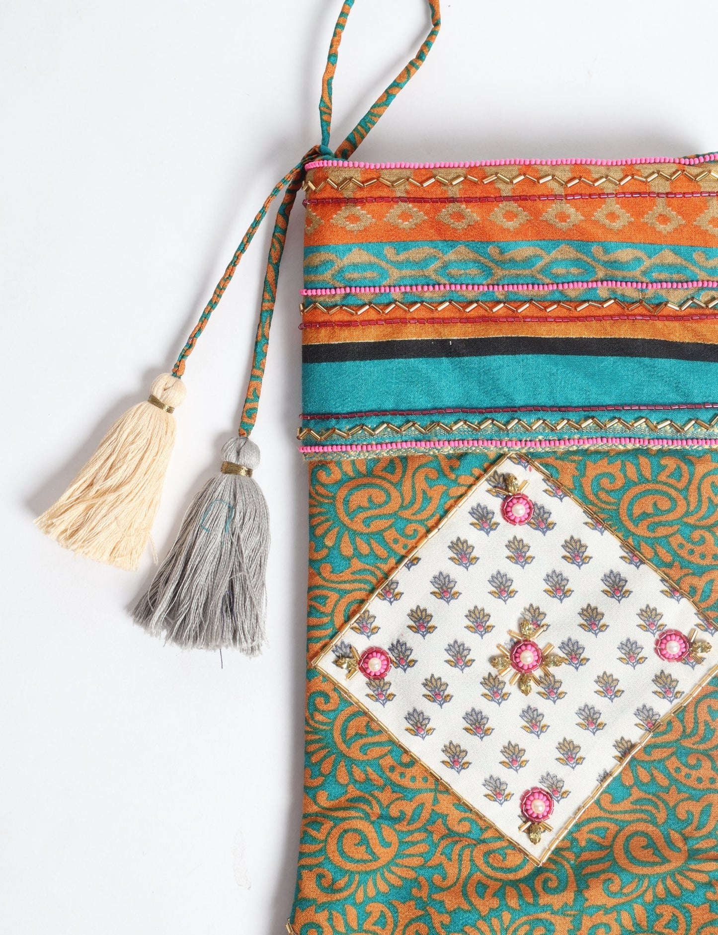 Cheer Christmas stocking made from recycled sari fabric with patchwork, gold hand embroidery, stones, sequins, pearls, glass beads, heart charm, and tassel — upcycled women’s clothing, conscious clothing, green fashion, upcycling fashion, environmentally friendly clothing, products made from textile waste, repurposed clothing, carbon neutral fashion, eco clothing, natural clothing.