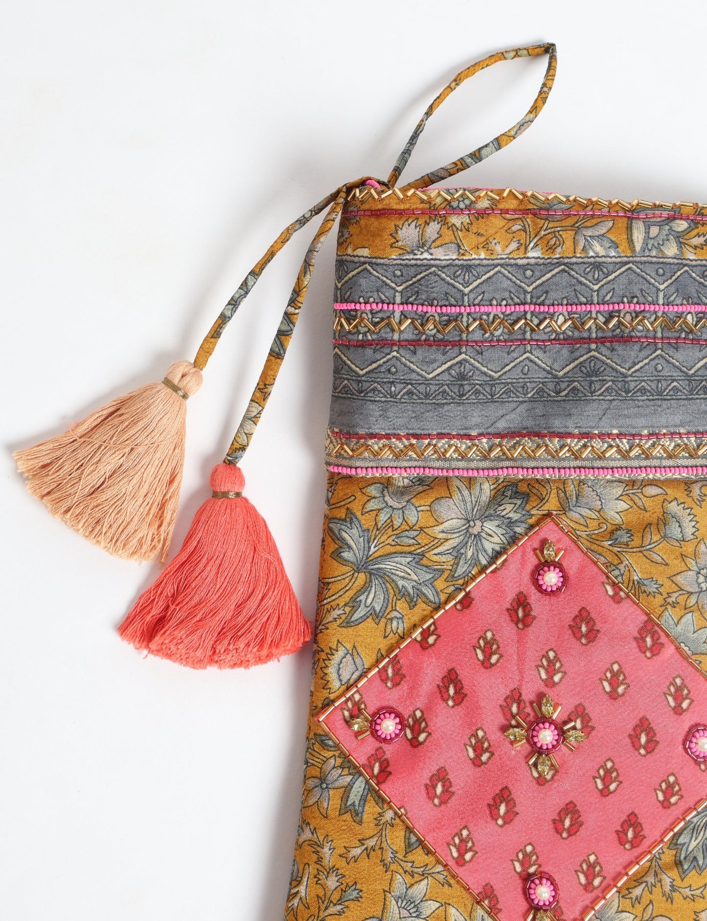 Cheer Christmas stocking made from recycled sari fabric with patchwork, gold hand embroidery, stones, sequins, pearls, glass beads, heart charm, and tassel — upcycled women’s clothing, conscious clothing, green fashion, upcycling fashion, environmentally friendly clothing, products made from textile waste, repurposed clothing, carbon neutral fashion, eco clothing, natural clothing.