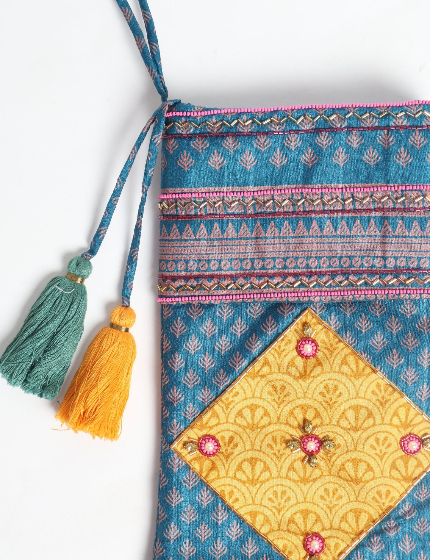 Cheer Christmas stocking made from recycled sari fabric with patchwork, gold hand embroidery, stones, sequins, pearls, glass beads, heart charm, and tassel — upcycled women’s clothing, conscious clothing, green fashion, upcycling fashion, environmentally friendly clothing, products made from textile waste, repurposed clothing, carbon neutral fashion, eco clothing, natural clothing.