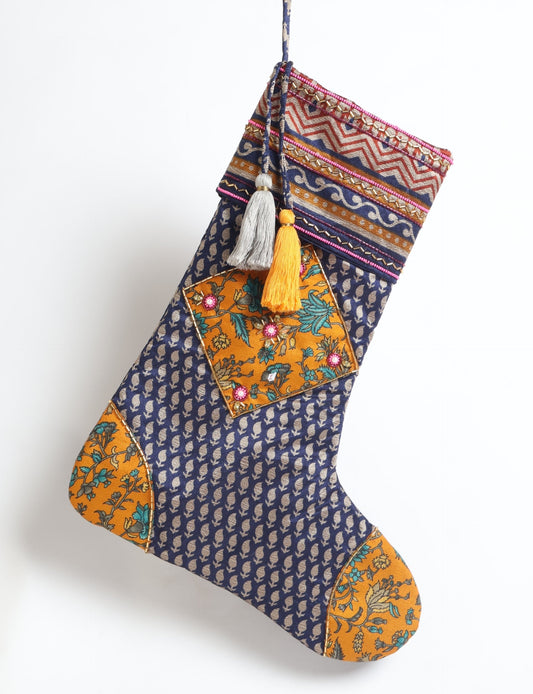Cheer Christmas stocking made from recycled sari fabric with patchwork, gold hand embroidery, stones, sequins, pearls, glass beads, heart charm, and tassel — upcycled women’s clothing, conscious clothing, green fashion, upcycling fashion, environmentally friendly clothing, products made from textile waste, repurposed clothing, carbon neutral fashion, eco clothing, natural clothing.