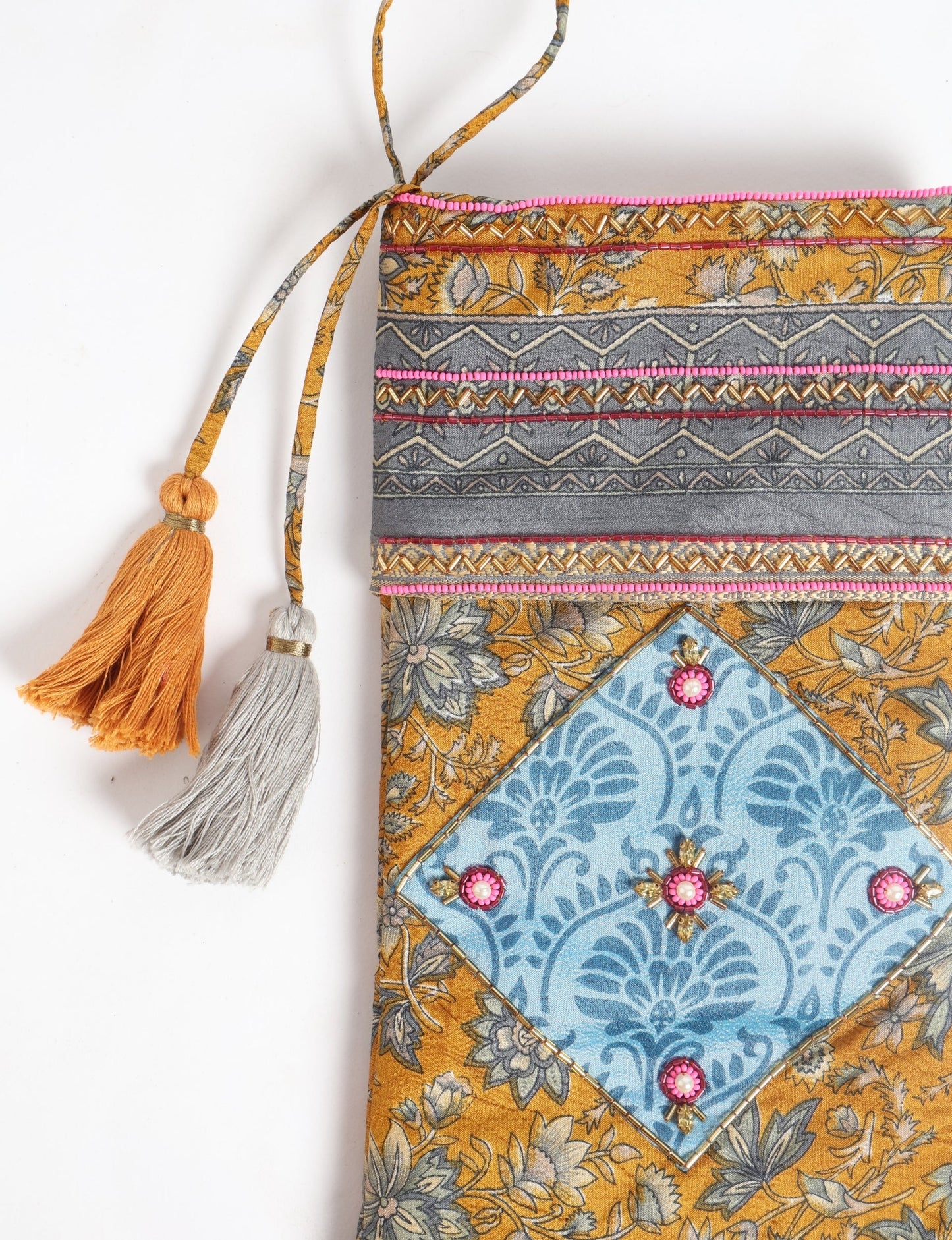 Cheer Christmas stocking made from recycled sari fabric with patchwork, gold hand embroidery, stones, sequins, pearls, glass beads, heart charm, and tassel — upcycled women’s clothing, conscious clothing, green fashion, upcycling fashion, environmentally friendly clothing, products made from textile waste, repurposed clothing, carbon neutral fashion, eco clothing, natural clothing.