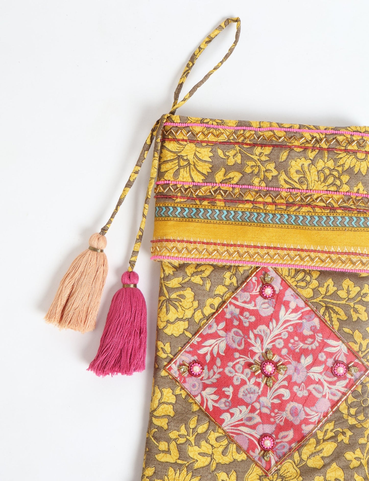 Cheer Christmas stocking made from recycled sari fabric with patchwork, gold hand embroidery, stones, sequins, pearls, glass beads, heart charm, and tassel — upcycled women’s clothing, conscious clothing, green fashion, upcycling fashion, environmentally friendly clothing, products made from textile waste, repurposed clothing, carbon neutral fashion, eco clothing, natural clothing.