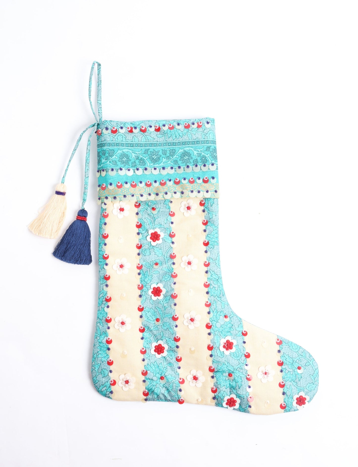 Upcycled sari Christmas stocking with floral beadwork, showcasing ethical fashion, recycled material clothing, fair trade fashion craftsmanship, and environment friendly clothing design.