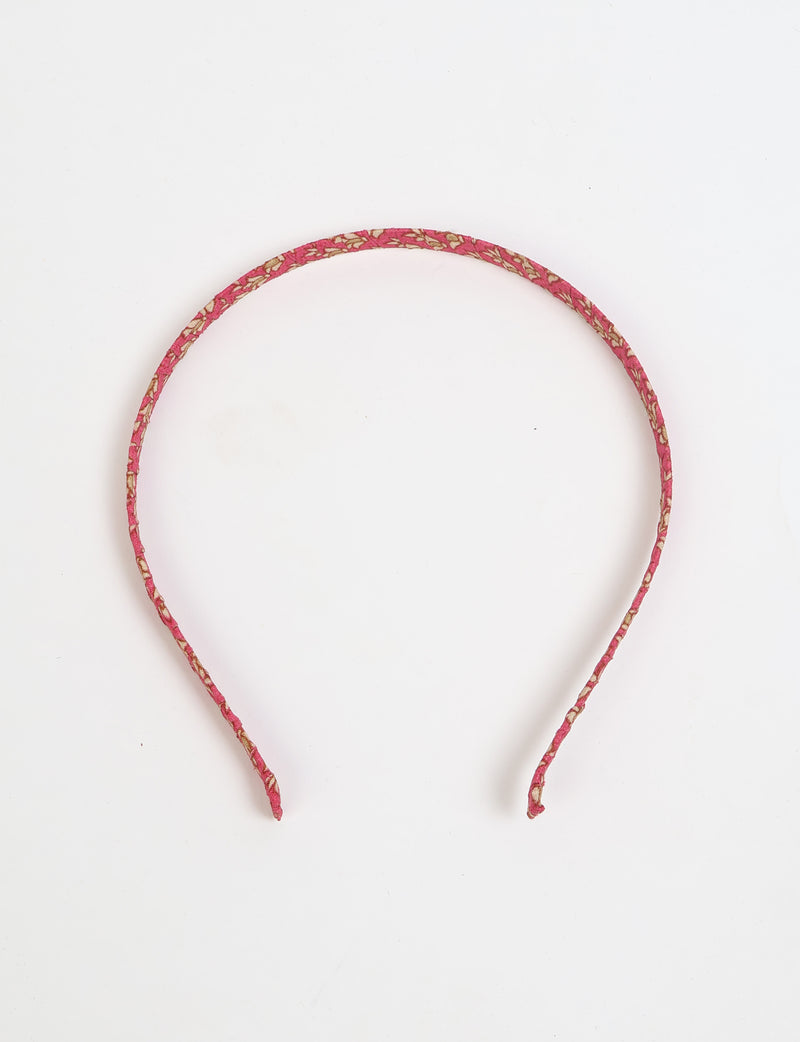 Thin fabric-wrapped metal hairband for a clean and stylish everyday look