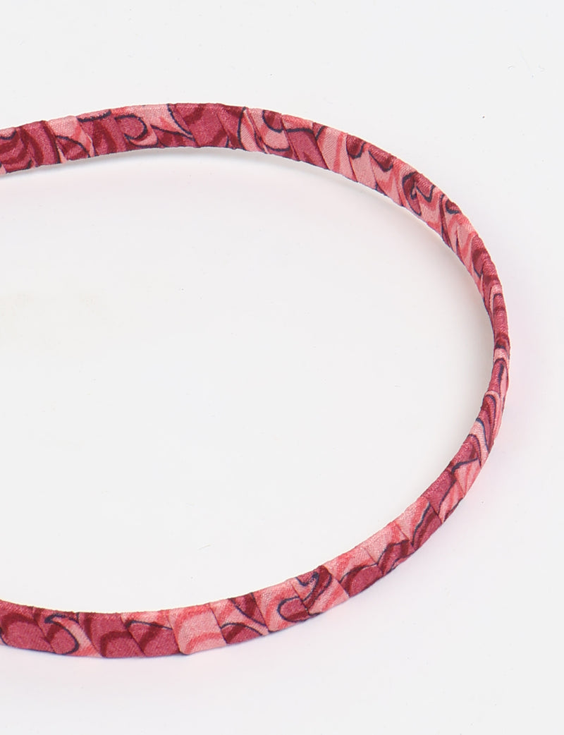 Thin fabric-wrapped metal hairband for a clean and stylish everyday look