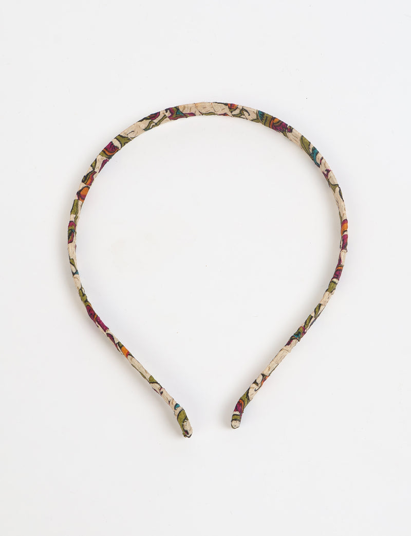 Thin fabric-wrapped metal hairband for a clean and stylish everyday look
