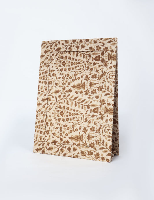 A4 size fabric photo frame with fold-out stand, made using upcycled clothing and recycled fashion concepts. Ideal for showcasing pictures, this eco friendly cloth-inspired frame highlights conscious clothing, zero waste clothing, and the essence of slow fashion.