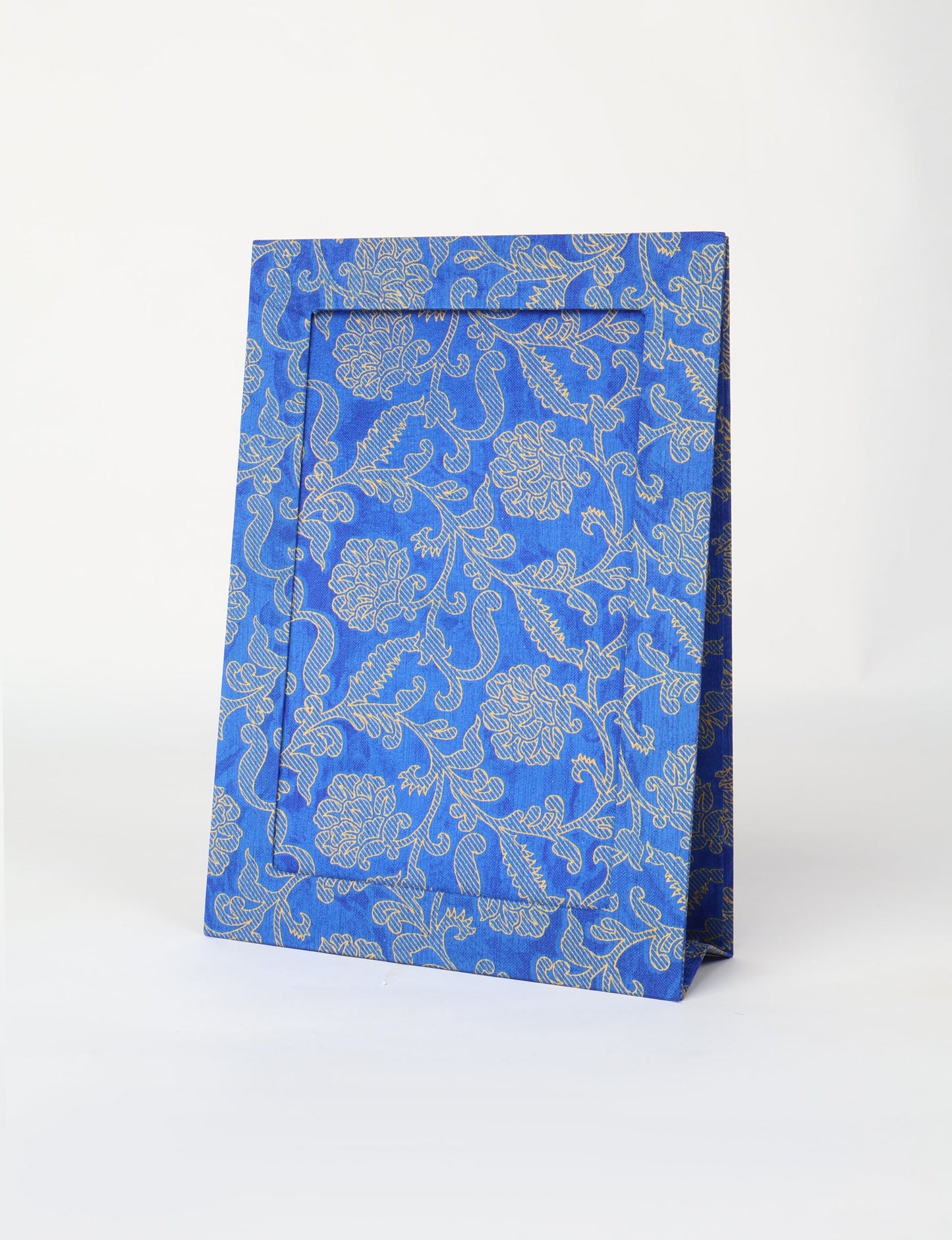 A4 size fabric photo frame with fold-out stand, made using upcycled clothing and recycled fashion concepts. Ideal for showcasing pictures, this eco friendly cloth-inspired frame highlights conscious clothing, zero waste clothing, and the essence of slow fashion.