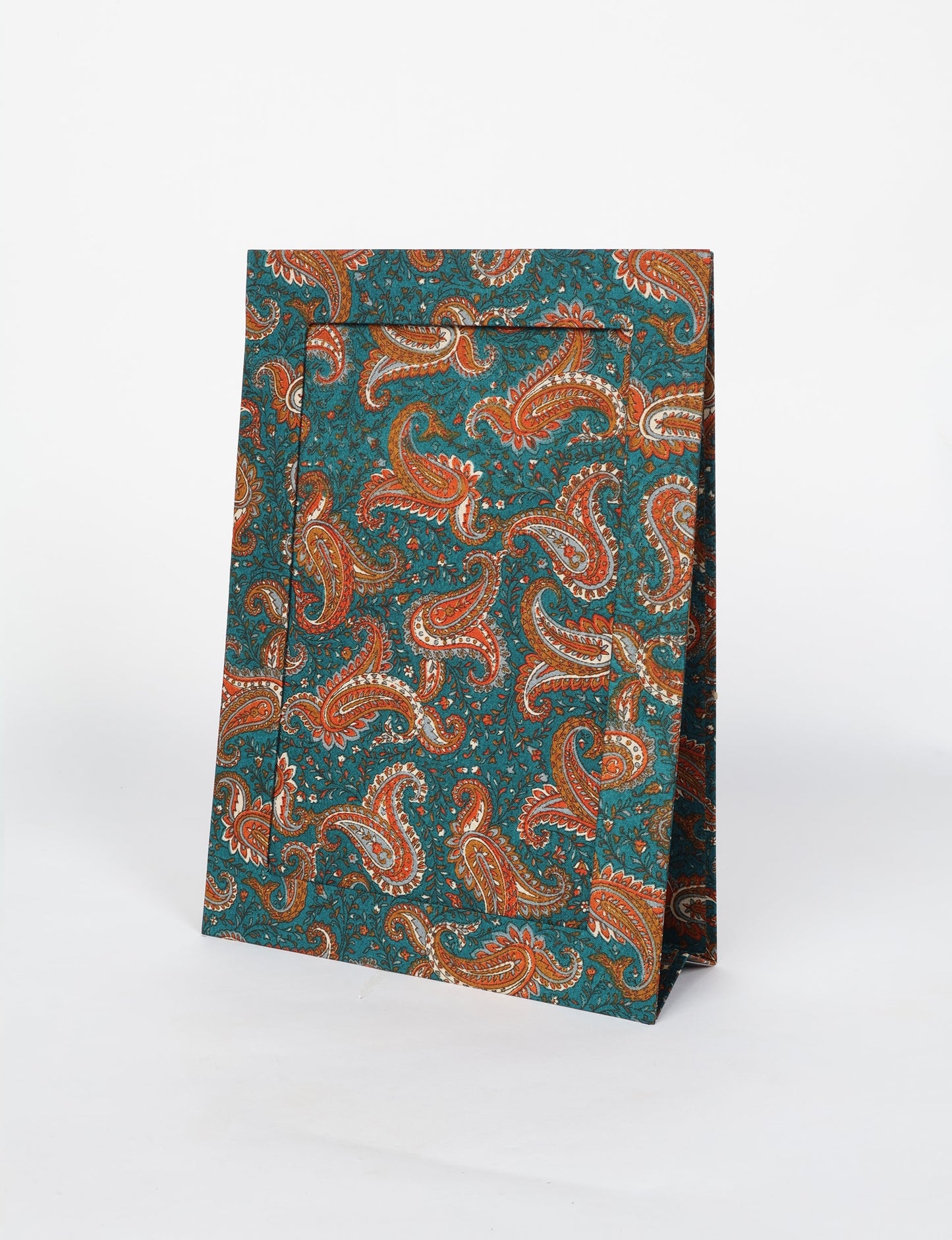 A4 size fabric photo frame with fold-out stand, made using upcycled clothing and recycled fashion concepts. Ideal for showcasing pictures, this eco friendly cloth-inspired frame highlights conscious clothing, zero waste clothing, and the essence of slow fashion.