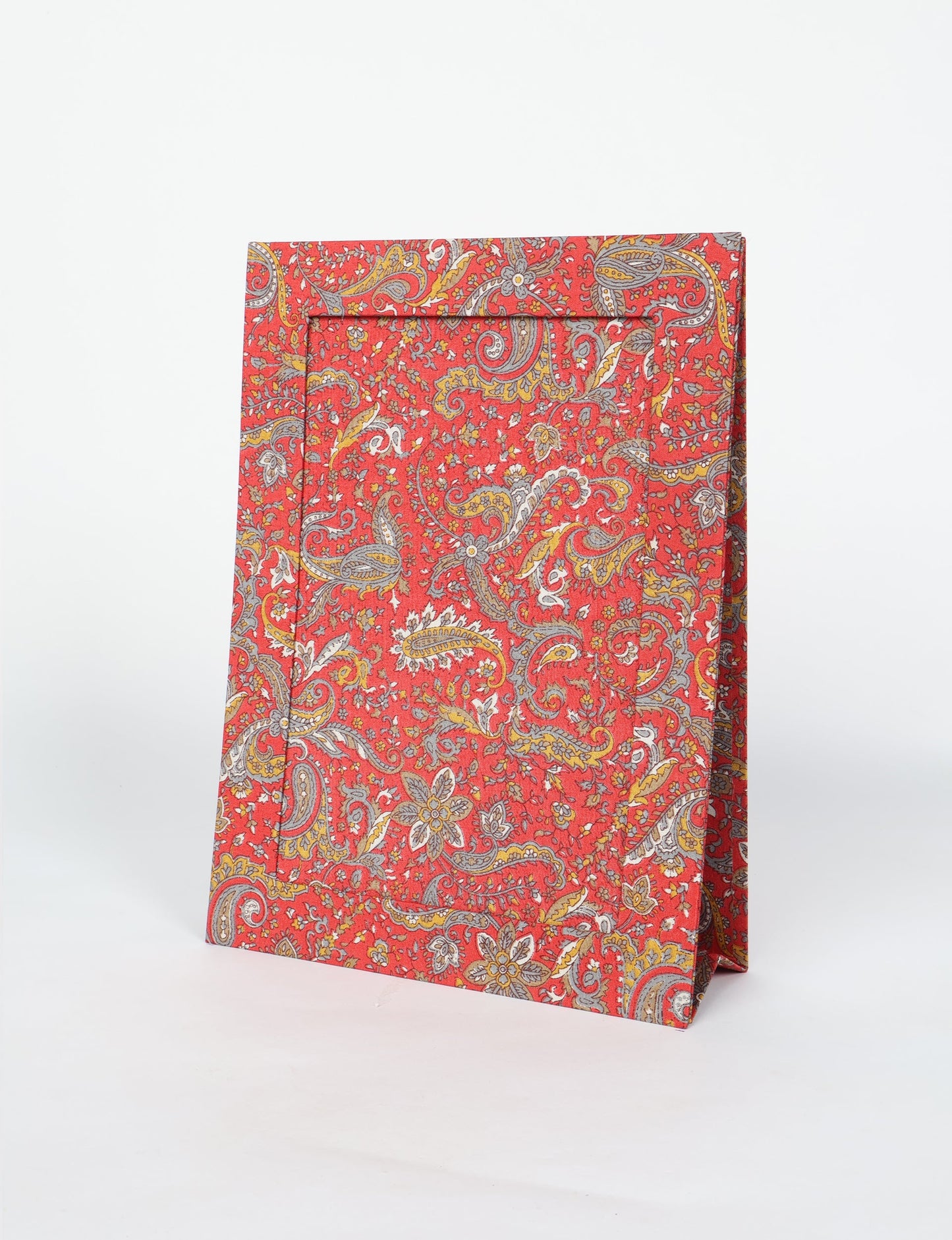 A4 size fabric photo frame with fold-out stand, made using upcycled clothing and recycled fashion concepts. Ideal for showcasing pictures, this eco friendly cloth-inspired frame highlights conscious clothing, zero waste clothing, and the essence of slow fashion.