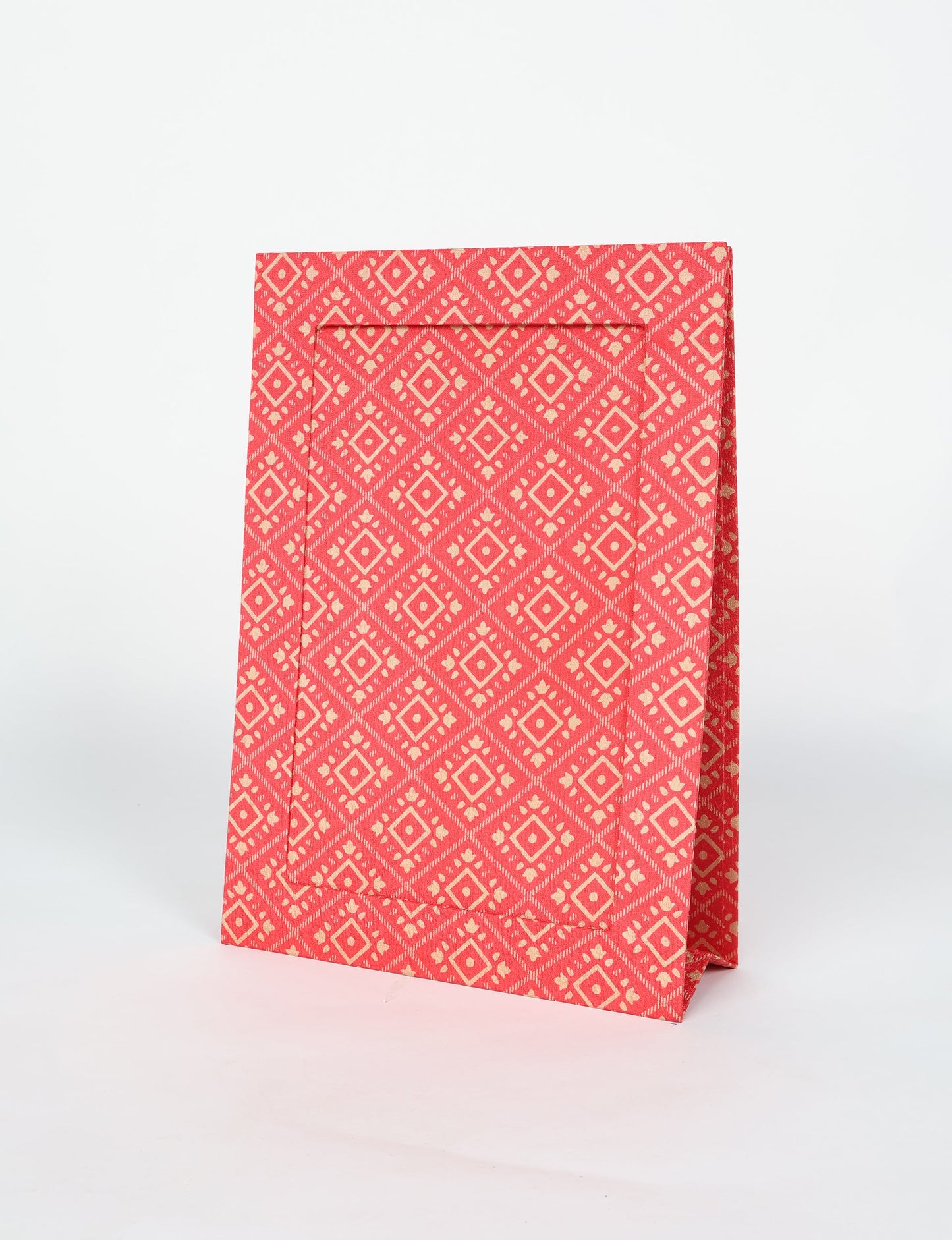 A4 size fabric photo frame with fold-out stand, made using upcycled clothing and recycled fashion concepts. Ideal for showcasing pictures, this eco friendly cloth-inspired frame highlights conscious clothing, zero waste clothing, and the essence of slow fashion.