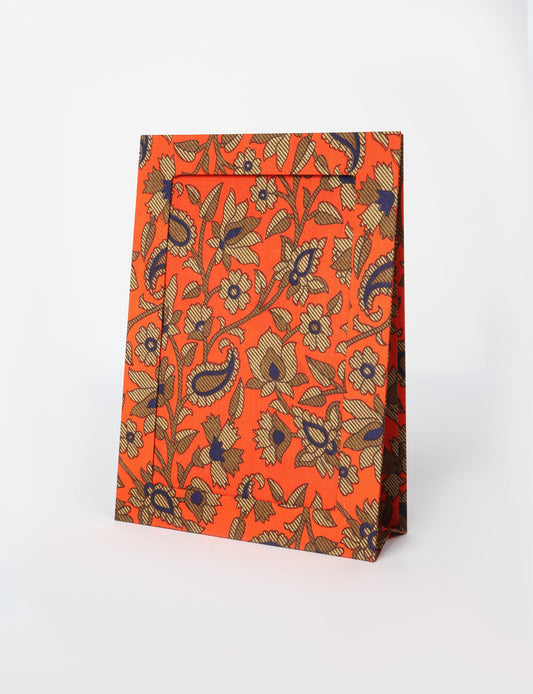 A4 size fabric photo frame with fold-out stand, made using upcycled clothing and recycled fashion concepts. Ideal for showcasing pictures, this eco friendly cloth-inspired frame highlights conscious clothing, zero waste clothing, and the essence of slow fashion.