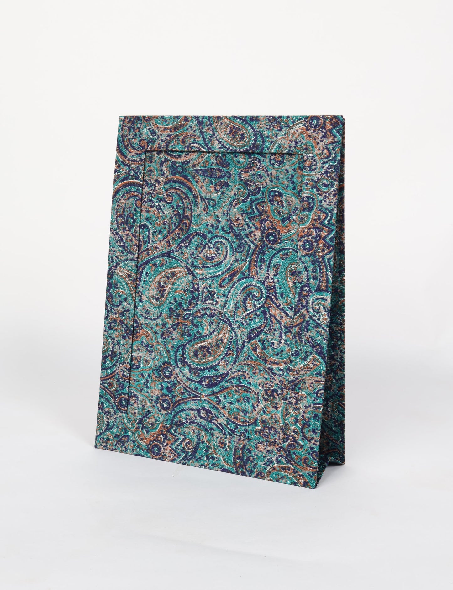 A4 size fabric photo frame with fold-out stand, made using upcycled clothing and recycled fashion concepts. Ideal for showcasing pictures, this eco friendly cloth-inspired frame highlights conscious clothing, zero waste clothing, and the essence of slow fashion.