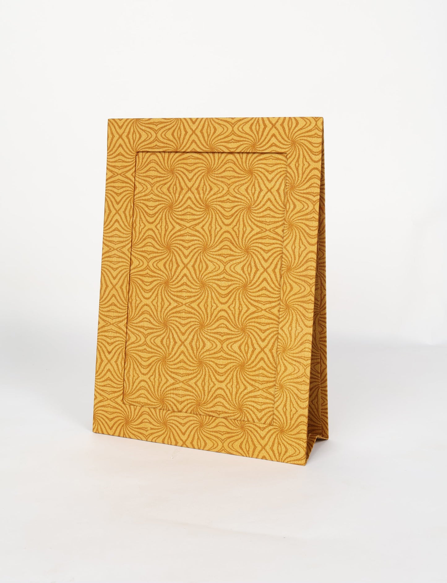 A4 size fabric photo frame with fold-out stand, made using upcycled clothing and recycled fashion concepts. Ideal for showcasing pictures, this eco friendly cloth-inspired frame highlights conscious clothing, zero waste clothing, and the essence of slow fashion.