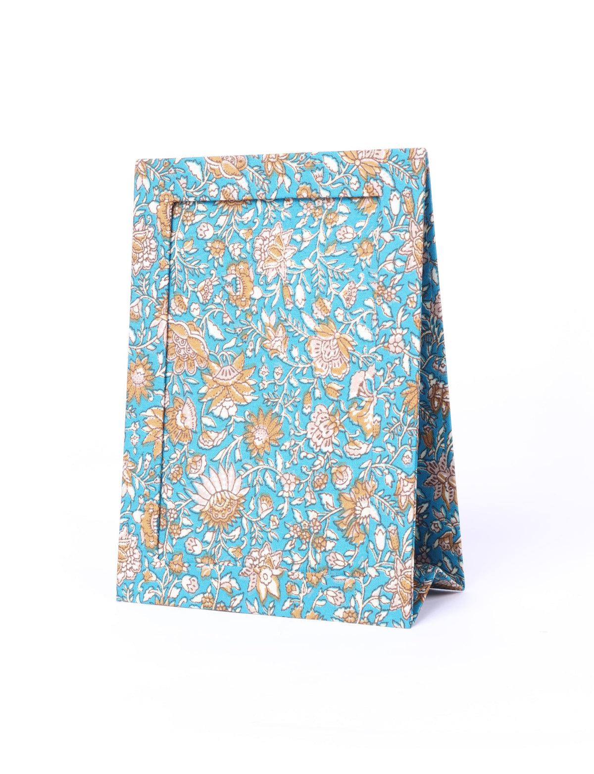 A5 rectangular fabric-covered tabletop photo frame with fold-out stand, created using upcycled clothing and repurposed clothing techniques. An eco friendly product inspired by zero waste clothing, fair trade fashion, and environmentally friendly clothing ideals, perfect for displaying photos or posters.