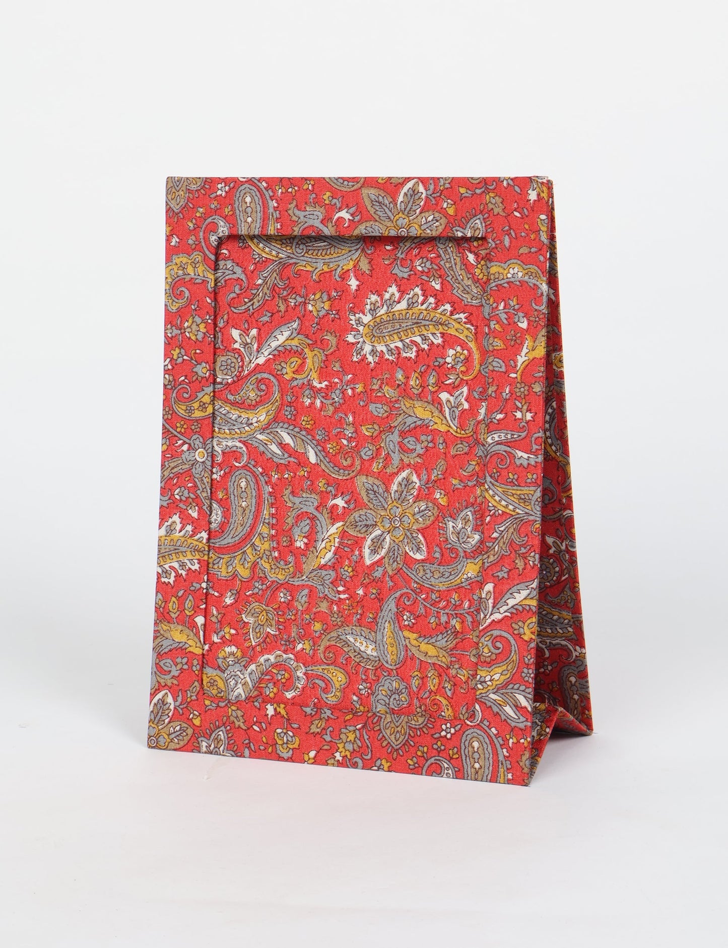 A5 rectangular fabric-covered tabletop photo frame with fold-out stand, created using upcycled clothing and repurposed clothing techniques. An eco friendly product inspired by zero waste clothing, fair trade fashion, and environmentally friendly clothing ideals, perfect for displaying photos or posters.