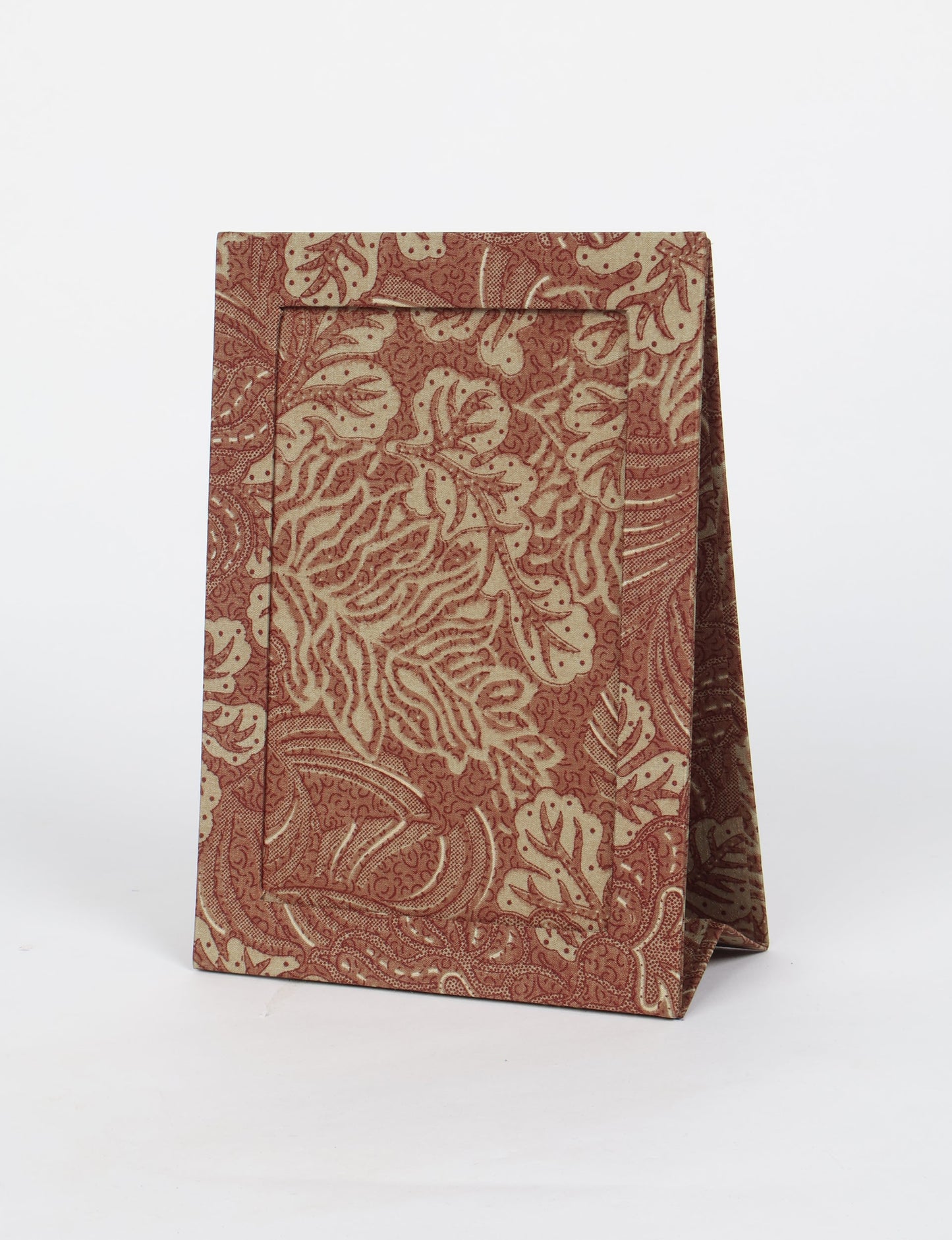 A5 rectangular fabric-covered tabletop photo frame with fold-out stand, created using upcycled clothing and repurposed clothing techniques. An eco friendly product inspired by zero waste clothing, fair trade fashion, and environmentally friendly clothing ideals, perfect for displaying photos or posters.