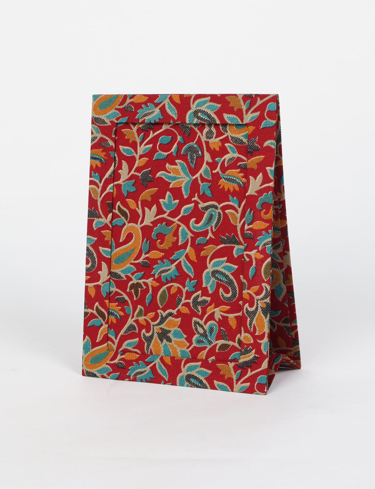 A5 rectangular fabric-covered tabletop photo frame with fold-out stand, created using upcycled clothing and repurposed clothing techniques. An eco friendly product inspired by zero waste clothing, fair trade fashion, and environmentally friendly clothing ideals, perfect for displaying photos or posters.
