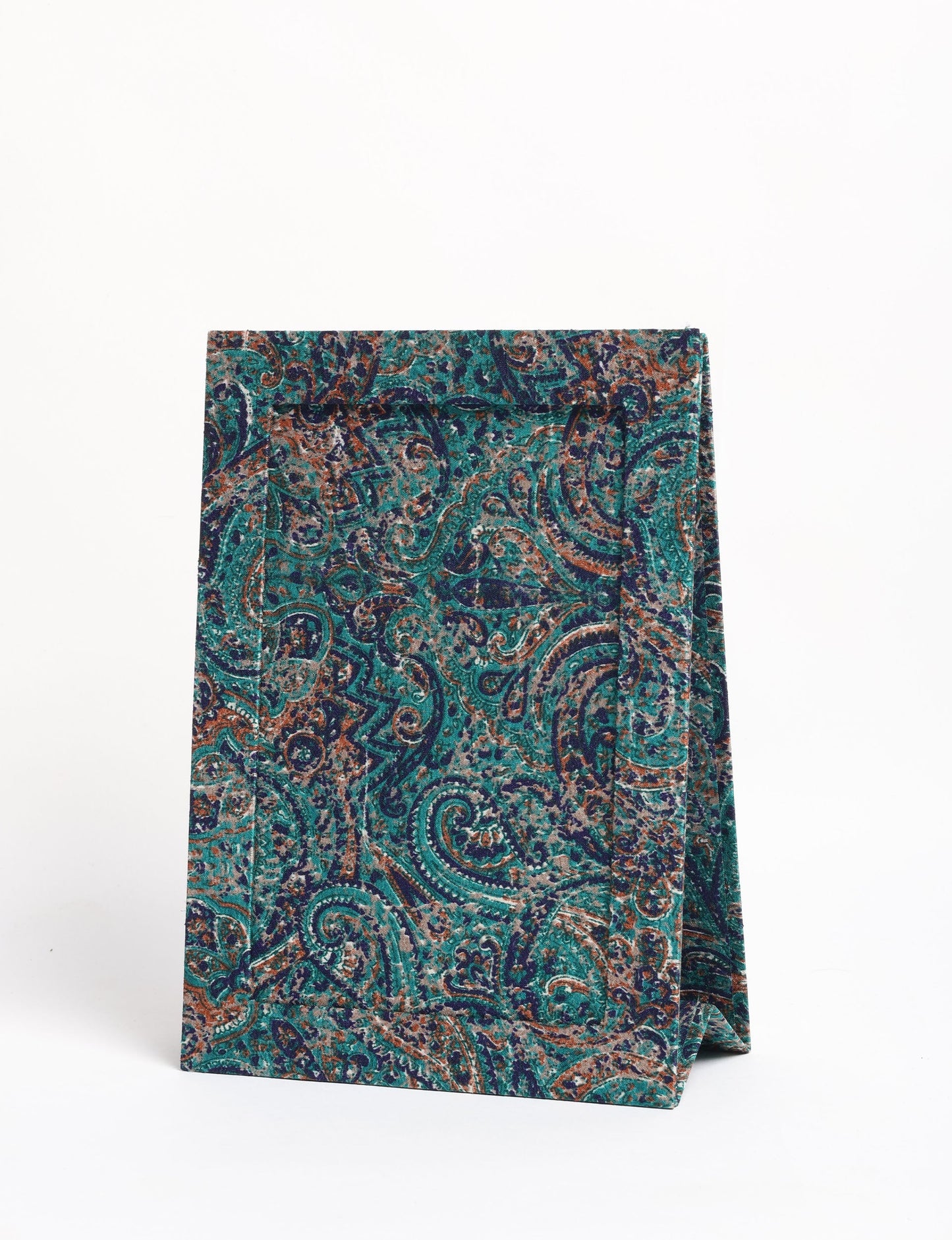 A5 rectangular fabric-covered tabletop photo frame with fold-out stand, created using upcycled clothing and repurposed clothing techniques. An eco friendly product inspired by zero waste clothing, fair trade fashion, and environmentally friendly clothing ideals, perfect for displaying photos or posters.