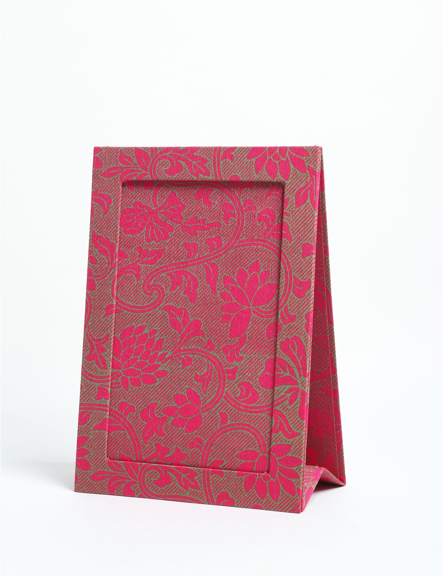 A5 rectangular fabric-covered tabletop photo frame with fold-out stand, created using upcycled clothing and repurposed clothing techniques. An eco friendly product inspired by zero waste clothing, fair trade fashion, and environmentally friendly clothing ideals, perfect for displaying photos or posters.