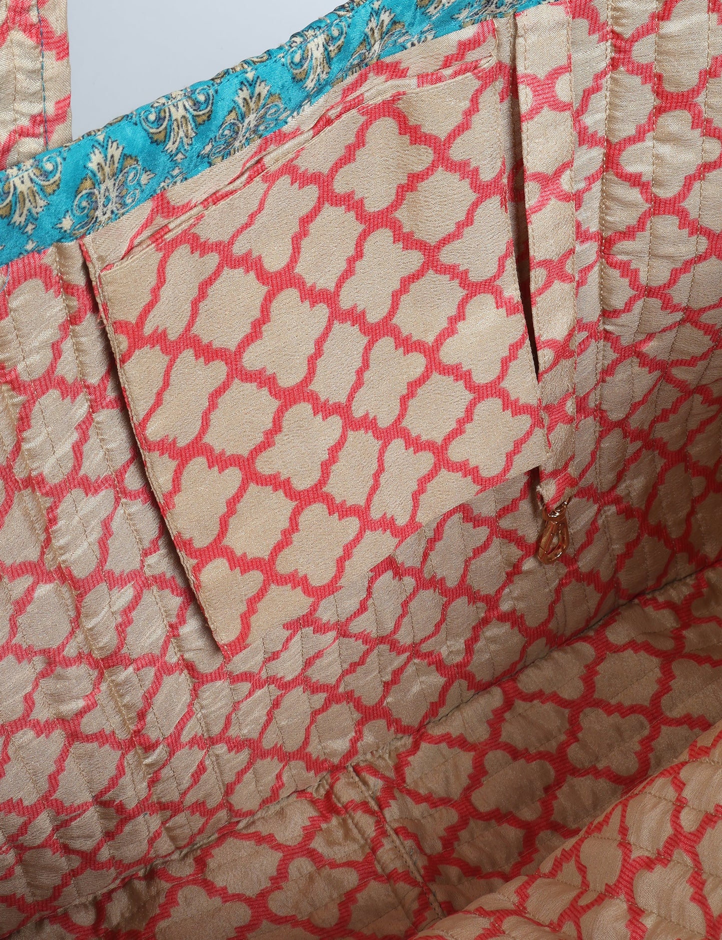 Quilted work tote bag with structured rectangular design and long shoulder straps, representing slow fashion and ethical clothing ideals, made as part of upcycled women's clothing and sustainable women's clothing using recycled fashion and earth friendly clothing practices.