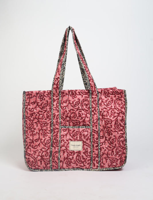 Quilted work tote bag with structured rectangular design and long shoulder straps, representing slow fashion and ethical clothing ideals, made as part of upcycled women's clothing and sustainable women's clothing using recycled fashion and earth friendly clothing practices.