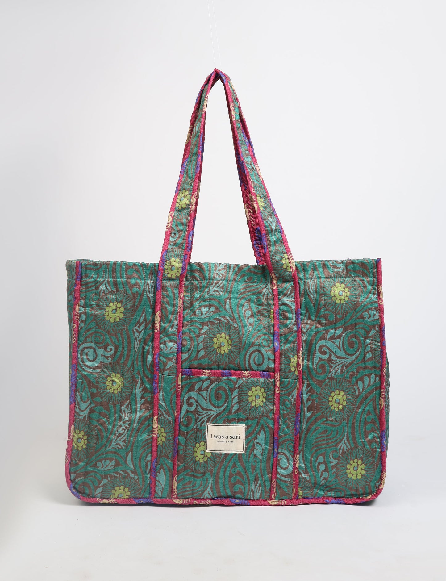 Quilted work tote bag with structured rectangular design and long shoulder straps, representing slow fashion and ethical clothing ideals, made as part of upcycled women's clothing and sustainable women's clothing using recycled fashion and earth friendly clothing practices.