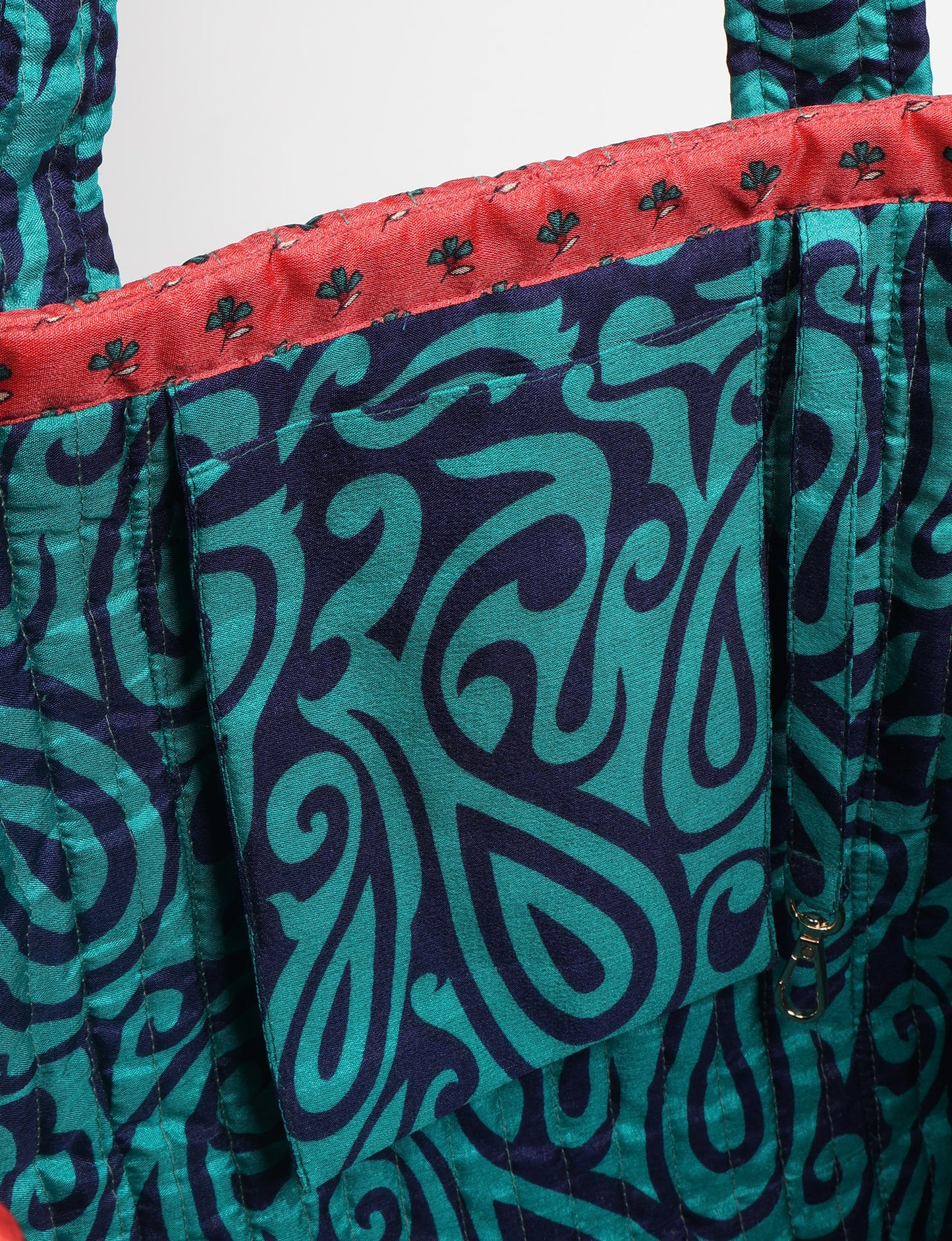 Quilted work tote bag with structured rectangular design and long shoulder straps, representing slow fashion and ethical clothing ideals, made as part of upcycled women's clothing and sustainable women's clothing using recycled fashion and earth friendly clothing practices.