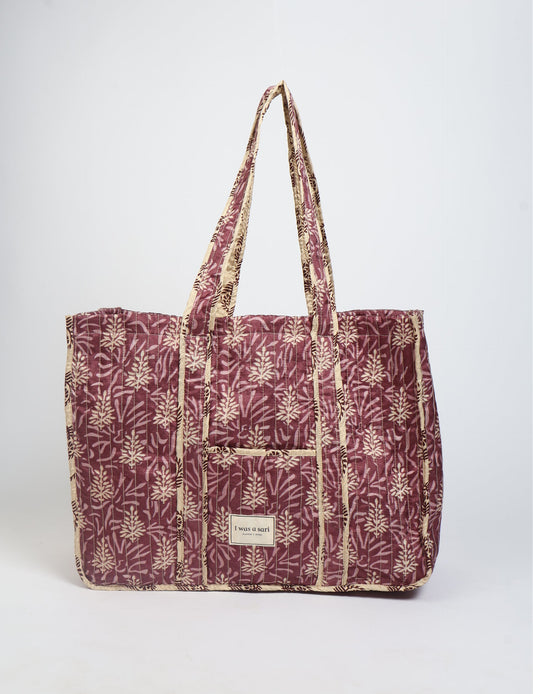 Quilted work tote bag with structured rectangular design and long shoulder straps, representing slow fashion and ethical clothing ideals, made as part of upcycled women's clothing and sustainable women's clothing using recycled fashion and earth friendly clothing practices.