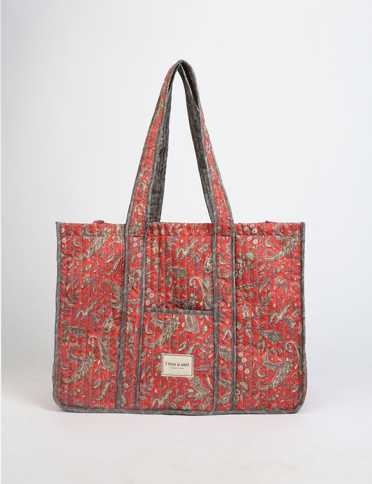 Quilted work tote bag with structured rectangular design and long shoulder straps, representing slow fashion and ethical clothing ideals, made as part of upcycled women's clothing and sustainable women's clothing using recycled fashion and earth friendly clothing practices.