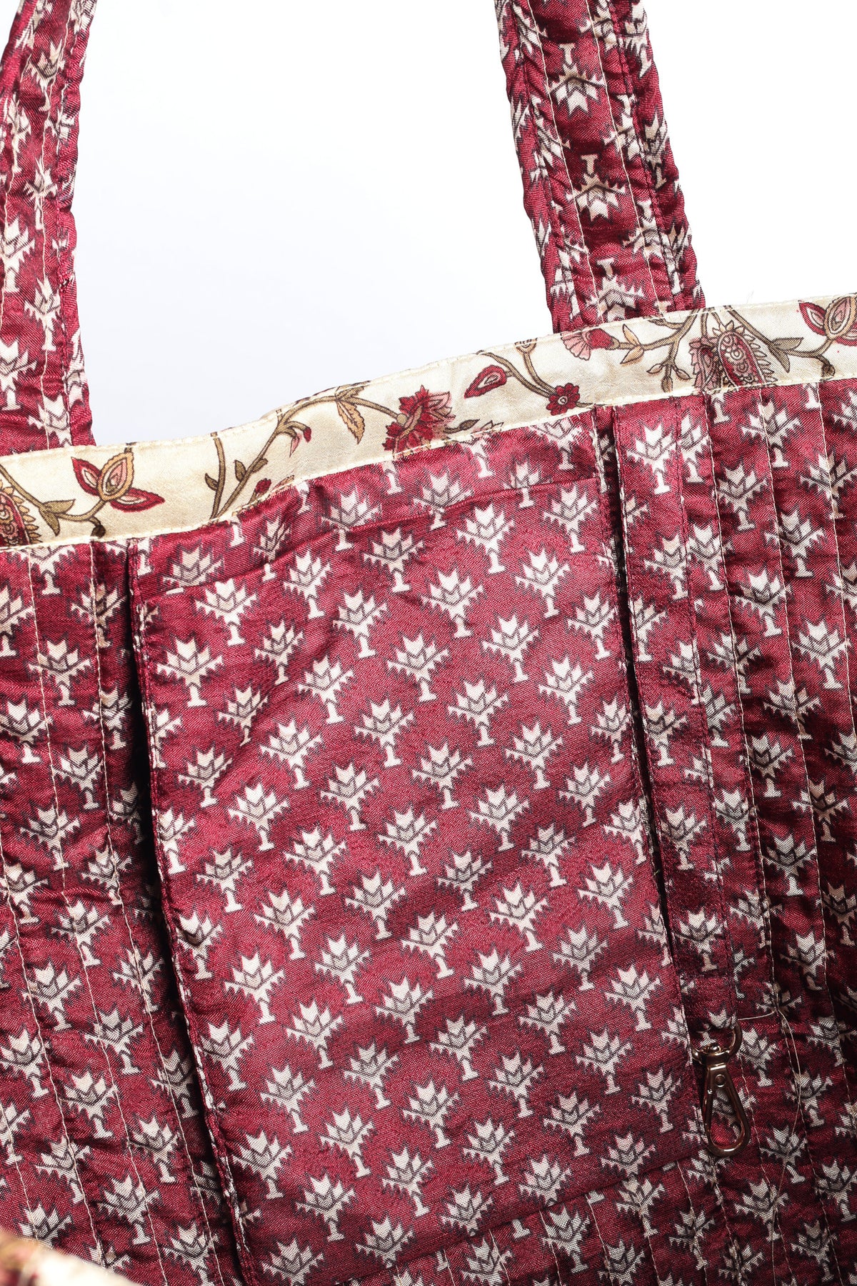 Quilted work tote bag with structured rectangular design and long shoulder straps, representing slow fashion and ethical clothing ideals, made as part of upcycled women's clothing and sustainable women's clothing using recycled fashion and earth friendly clothing practices.