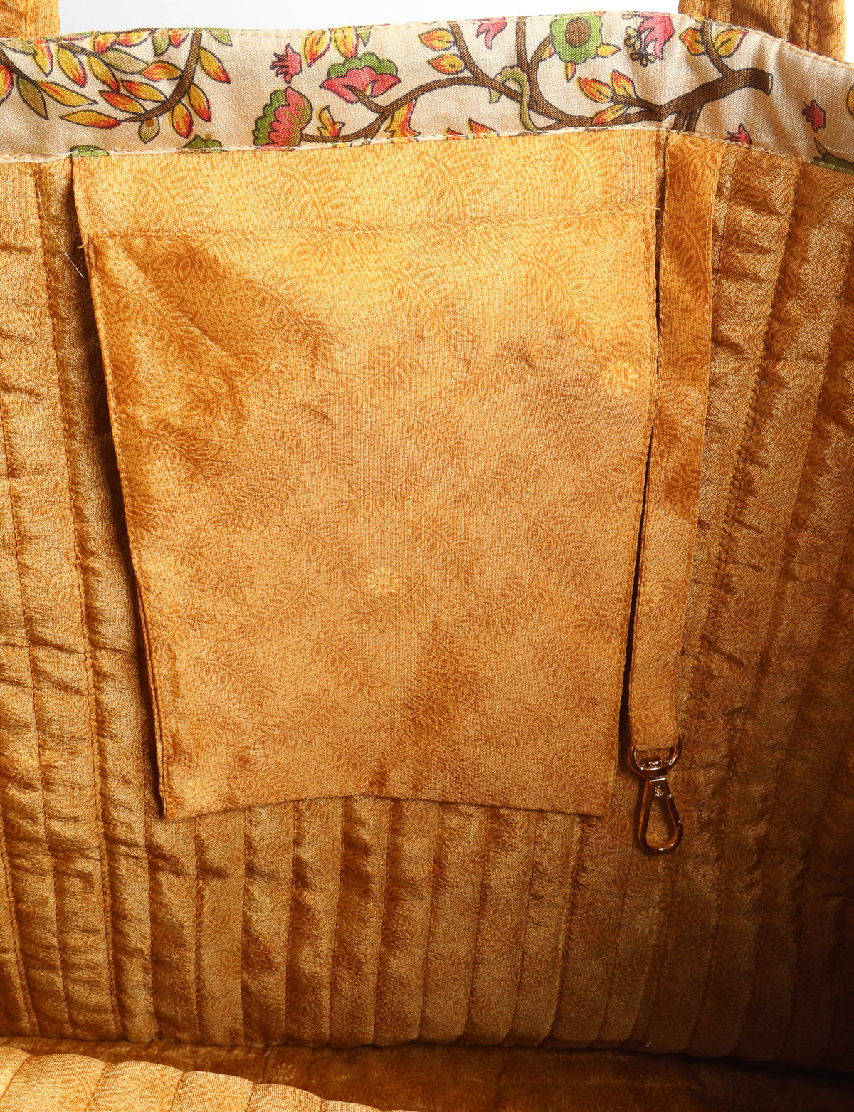 Quilted work tote bag with structured rectangular design and long shoulder straps, representing slow fashion and ethical clothing ideals, made as part of upcycled women's clothing and sustainable women's clothing using recycled fashion and earth friendly clothing practices.