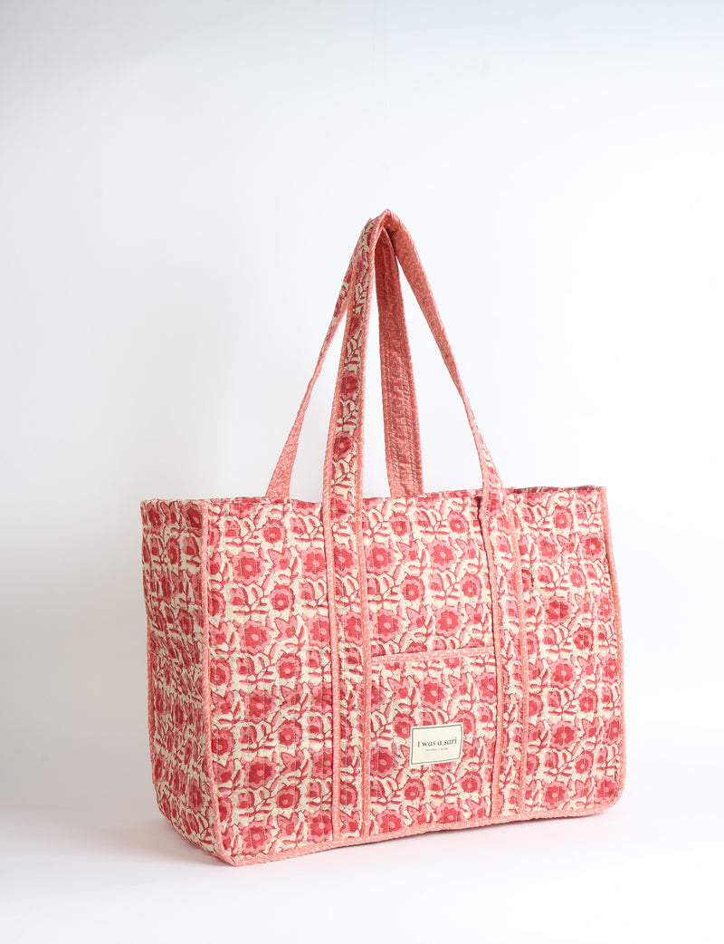 Quilted work tote bag with structured rectangular design and long shoulder straps, representing slow fashion and ethical clothing ideals, made as part of upcycled women's clothing and sustainable women's clothing using recycled fashion and earth friendly clothing practices.