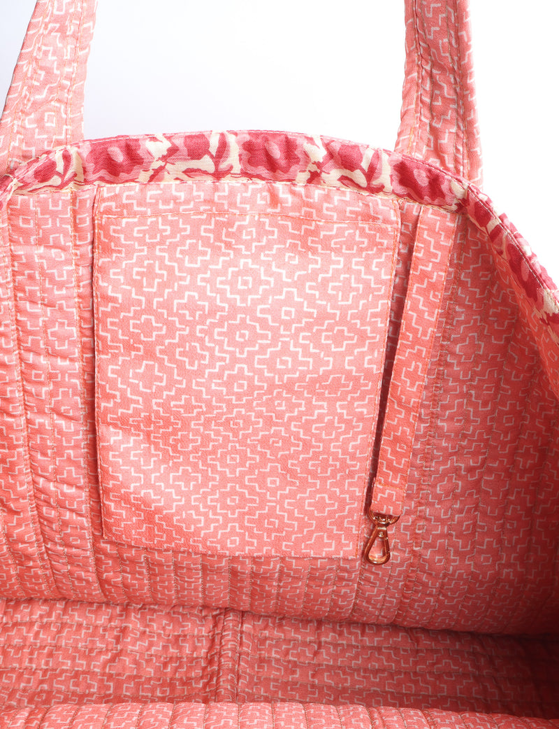 Quilted work tote bag with structured rectangular design and long shoulder straps, representing slow fashion and ethical clothing ideals, made as part of upcycled women's clothing and sustainable women's clothing using recycled fashion and earth friendly clothing practices.