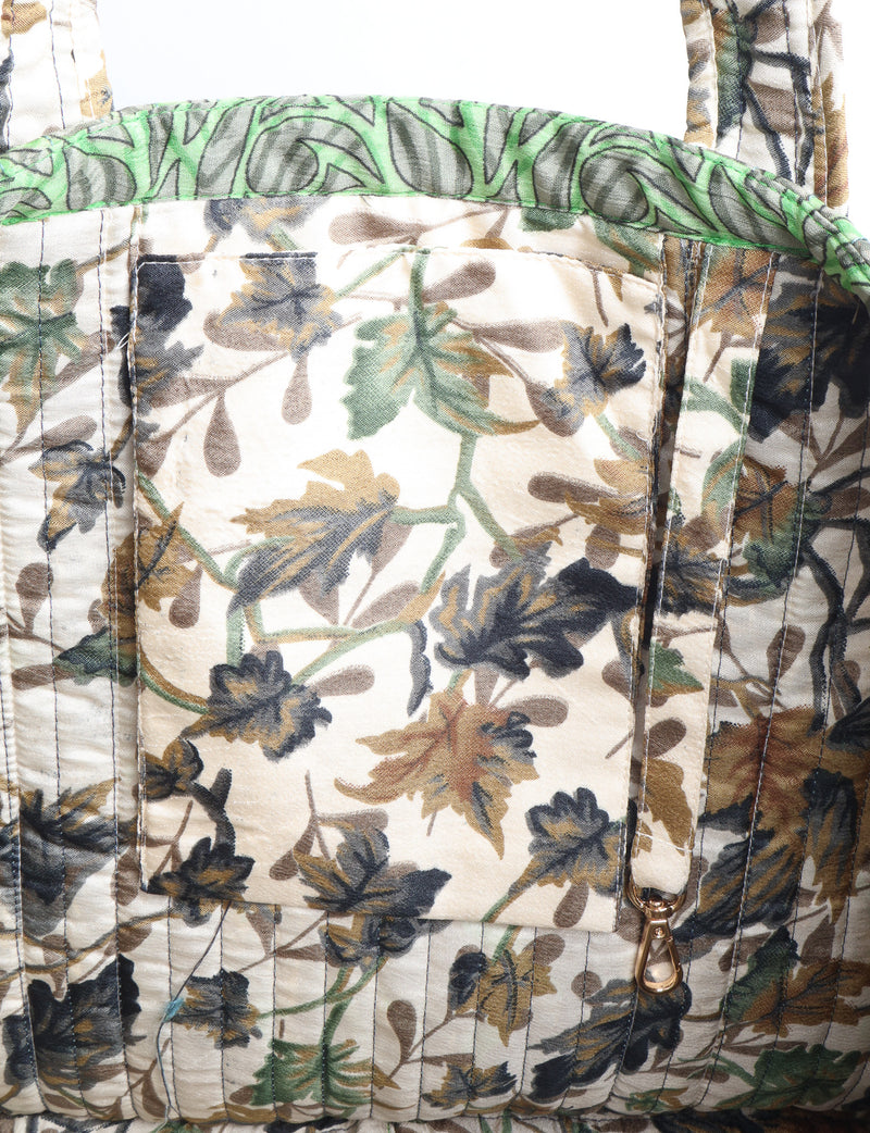 Quilted work tote bag with structured rectangular design and long shoulder straps, representing slow fashion and ethical clothing ideals, made as part of upcycled women's clothing and sustainable women's clothing using recycled fashion and earth friendly clothing practices.